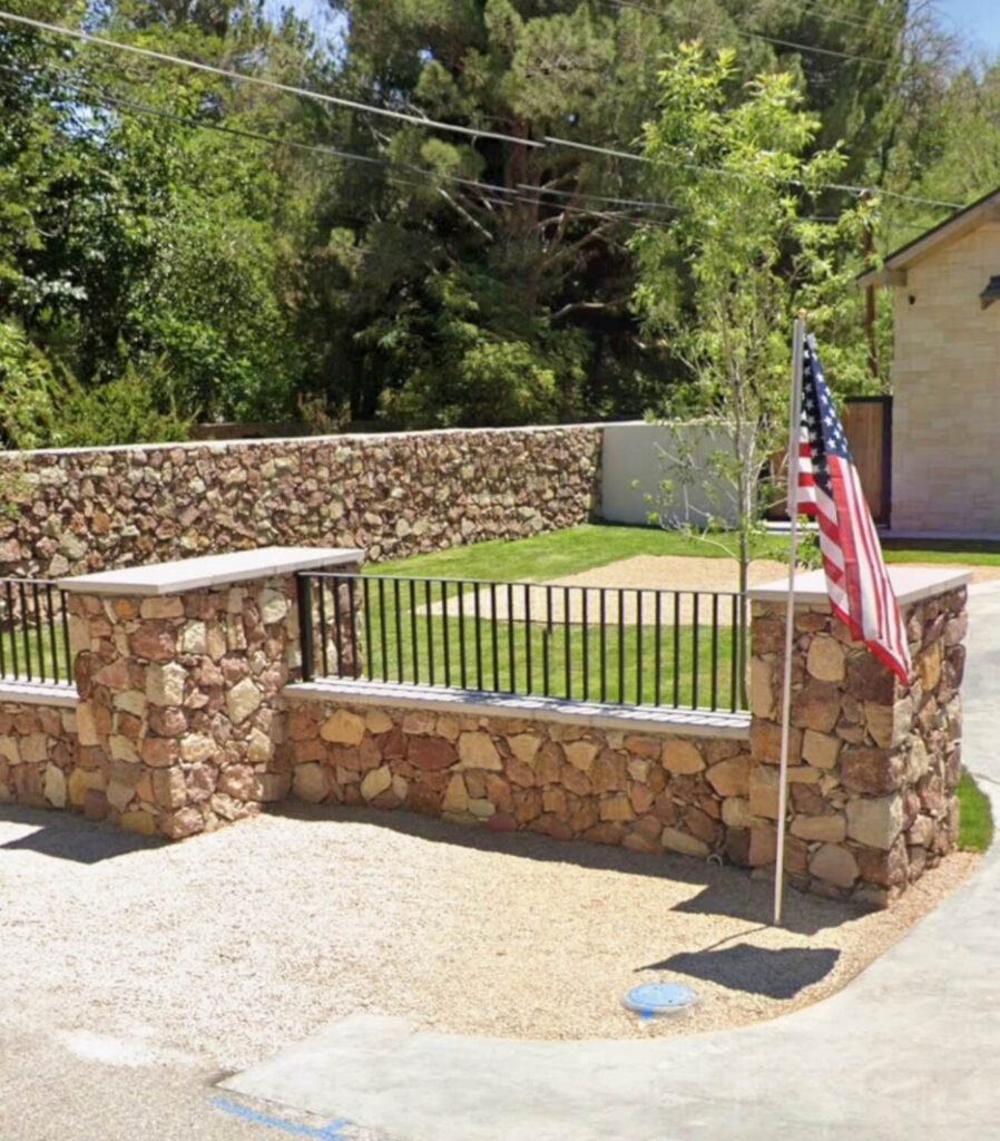 Decorative rock and metal wall in El Paso Texas